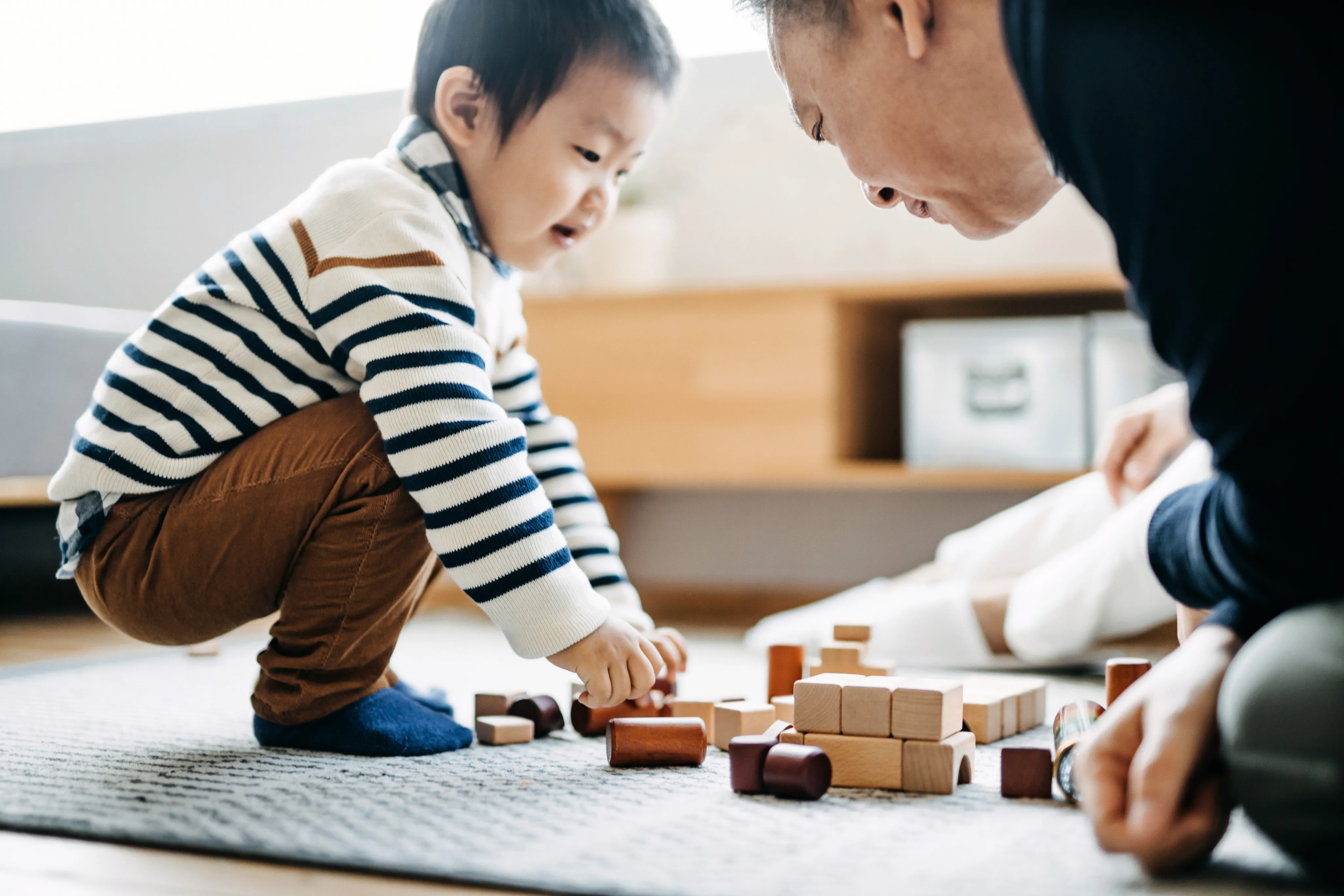 kid and father playing